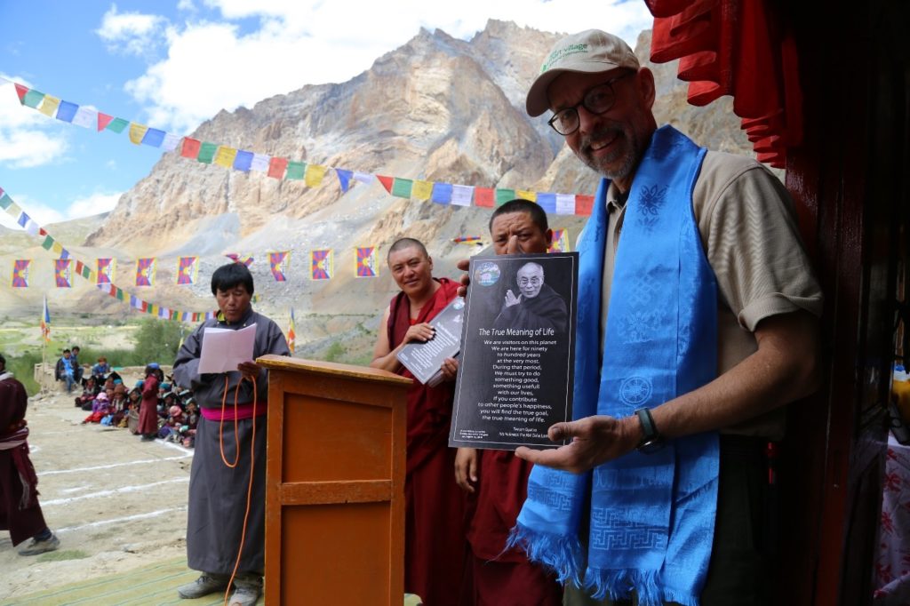 Sonam Dorje (L) in a gray robe reading the announcement upon my receiving a placard from the Dalai Lama (C) Mike Wilson (R) 