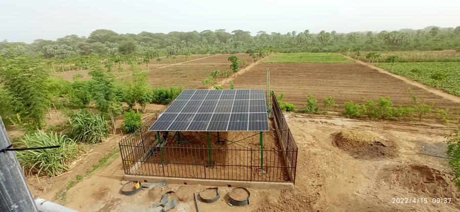 Solar farm microgrid in a field.